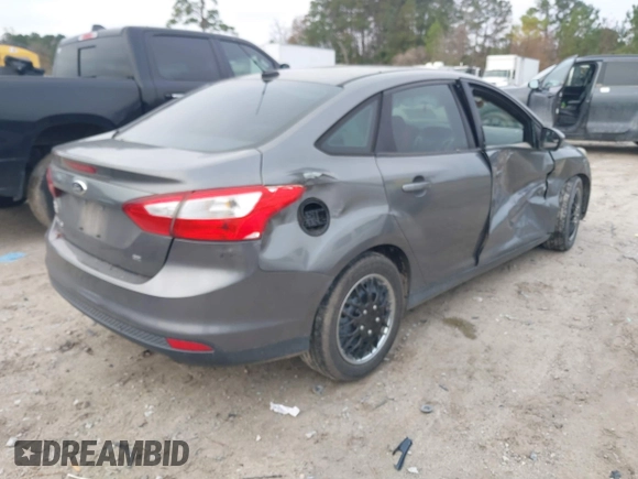 2012 Ford Focus SE with VIN 1FAHP3F24CL352340, listed as a IAAI auction lot 41118173 with 154,623 mi miles. Bid and sale history available at carsss.com. Image 4.