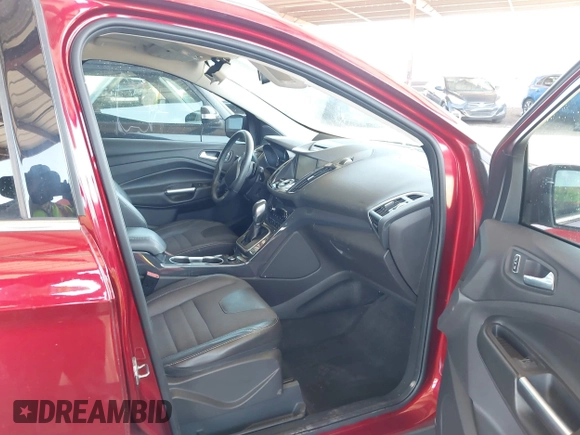 2013 Ford Escape Titanium with VIN 1FMCU0J96DUB08681, listed as a IAAI auction lot 42068864 with 102,094 mi miles and . Bid and sale history available at carsss.com. Image 5.