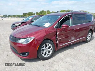 2017 Chrysler Pacifica Touring L with VIN 2C4RC1BG6HR739602, listed as a IAAI auction lot 42085250 with 96,377 mi miles and . Bid and sale history available at DreamBid. Image 17.