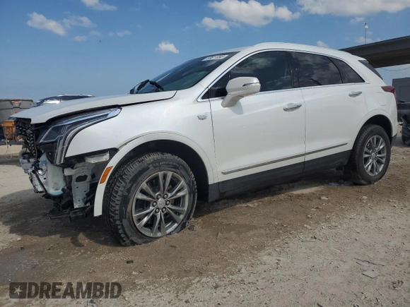 2021 Cadillac XT5 FWD Premium Luxury z VIN 1GYKNCRS7MZ115531, wystawiony jako Copart lot #53611095 z przebiegiem 34 931 mil mil oraz Szkoda całkowita • Salvage title. Historia ofert i sprzedaży dostępna na DreamBid. Obrazek 1.