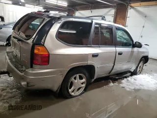 2007 GMC Envoy SLE with VIN 1GKDT13S572301992, listed as a Copart auction lot 87404174 with 131,741 mi miles and Salvage Title. Bid and sale history available at carsss.com. Image 3.
