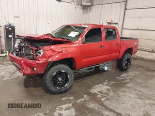 2015 Toyota Tacoma with VIN 3TMLU4EN3FM196518, listed as a IAAI auction lot 41198481 with 96,277 mi miles and . Bid and sale history available at DreamBid. Image 2.