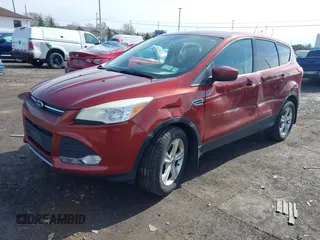 2014 Ford Escape SE with VIN 1FMCU9GX3EUA81161, listed as a IAAI auction lot 41968609 with 112,931 mi miles and . Bid and sale history available at DreamBid. Image 2.