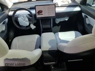 2020 Tesla Model Y Long Range with VIN 5YJYGDEF9LF023060, listed as a Copart auction lot 55462395 with 58,211 mi miles and Salvage Title. Bid and sale history available at DreamBid. Image 8.