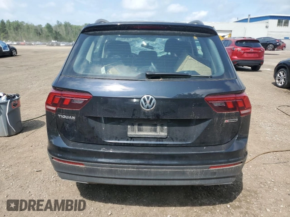 2020 Volkswagen Tiguan S с VIN 3VV0B7AX6LM094810, выставлен на аукционе Copart как лот 59793555 с пробегом 104 612 миль миль и Списание • Salvage title. История ставок и продаж доступна на DreamBid. Изображение 6.