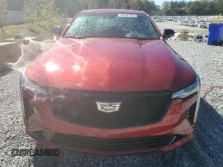 2024 Cadillac CT4 Premium Luxury z VIN 1G6DB5RK2R0100629, wystawiony jako Copart lot #76079204 z przebiegiem 23 279 mil mil oraz Czysty tytuł • Clean title. Historia ofert i sprzedaży dostępna na DreamBid. Obrazek 5.