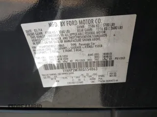 2014 Ford Police Interceptor z VIN 1FAHP2MT8EG154863, wystawiony jako IAAI lot #39828241 z przebiegiem 118 600 mil mil oraz . Historia ofert i sprzedaży dostępna na DreamBid. Obrazek 9.