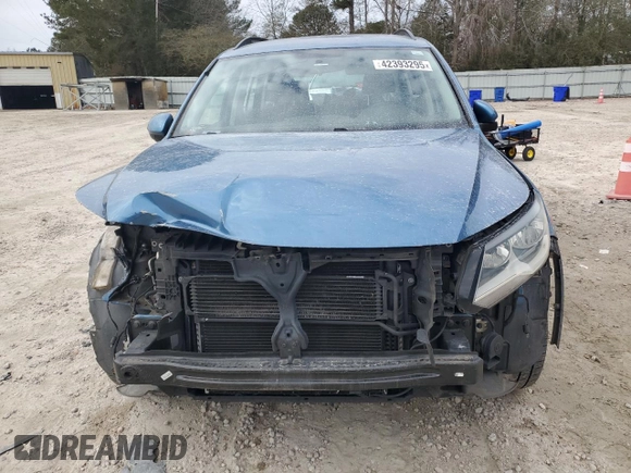 2017 Volkswagen Tiguan S with VIN WVGBV7AX2HK046312, listed as a Copart auction lot 42393295 with 94,814 mi miles and Salvage Title. Bid and sale history available at DreamBid. Image 5.