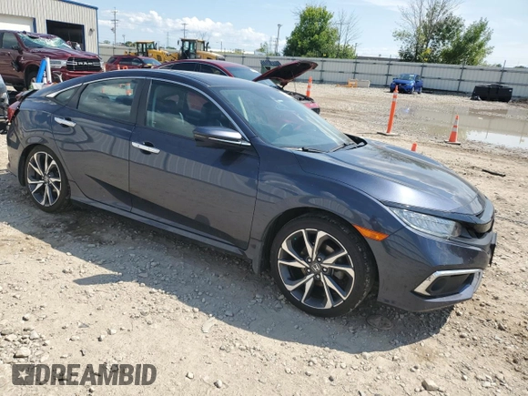 2020 Honda Civic Sedan Touring with VIN 2HGFC1F96LH101008, listed as a Copart auction lot 66308744 with 47,327 mi miles and Non Repairable. Bid and sale history available at carsss.com. Image 4.