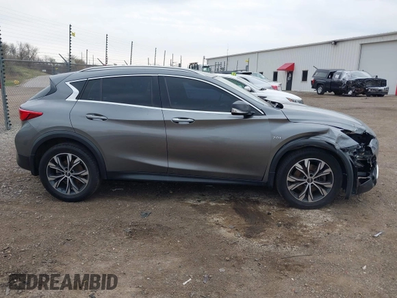 2017 Infiniti QX30 Premium z VIN SJKCH5CR2HA022260, wystawiony jako IAAI lot #42067553 z przebiegiem 85 301 mil mil oraz . Historia ofert i sprzedaży dostępna na DreamBid. Obrazek 13.