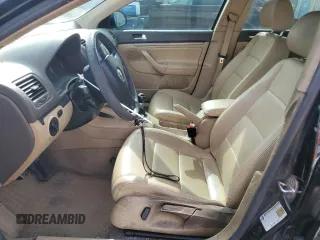 2006 Volkswagen Jetta 1.9L TDI z VIN 3VWST81KX6M746490, wystawiony jako Copart lot #58409565 z przebiegiem 229 433 mil mil oraz Szkoda całkowita • Salvage title. Historia ofert i sprzedaży dostępna na DreamBid. Obrazek 7.