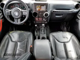 2014 Jeep Wrangler Unlimited Rubicon с VIN 1C4HJWFG1EL156853, выставлен на аукционе Copart как лот 58496795 с пробегом 112 073 миль миль и Списание • Salvage title. История ставок и продаж доступна на DreamBid. Изображение 8.