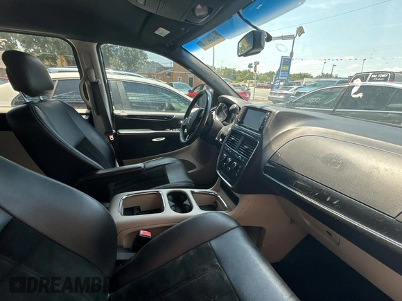 2014 Dodge Grand Caravan SXT with VIN 2C4RDGCG1ER308403, listed as a Copart auction lot 56712885 with 131,847 mi miles and Clean Title. Bid and sale history available at DreamBid. Image 5.