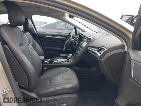 2015 Ford Fusion Energi Titanium with VIN 3FA6P0SU3FR114739, listed as a IAAI auction lot 42003011 with 120,553 mi miles. Bid and sale history available at carsss.com. Image 5.