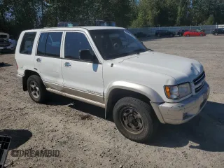 2000 Isuzu Trooper S z VIN JACDJ58X9Y7J09376, wystawiony jako Copart lot #69318184 z przebiegiem 219 355 mil mil oraz Szkody całkowita. Historia ofert i sprzedaży dostępna na DreamBid. Obrazek 4.