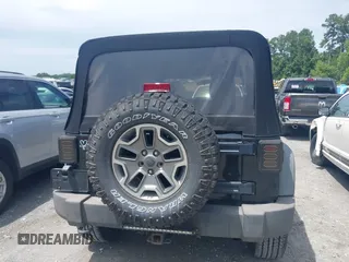 2012 Jeep Wrangler Unlimited Sport with VIN 1C4BJWDG0CL233718, listed as a IAAI auction lot 42551935 with 227,693 mi miles and . Bid and sale history available at DreamBid. Image 16.