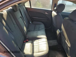 2012 Ford Fusion SE z VIN 3FAHP0HA0CR437115, wystawiony jako Copart lot #56583495 z przebiegiem 159 649 mil mil oraz Szkoda całkowita • Salvage title. Historia ofert i sprzedaży dostępna na DreamBid. Obrazek 10.