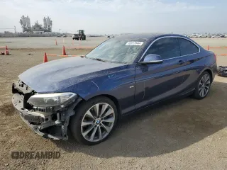 2014 BMW 2 Series 228i with VIN WBA1F5C55EV255662, listed as a Copart auction lot 65017644 with 71,940 mi miles and Salvage Title. Bid and sale history available at carsss.com. Image 1.