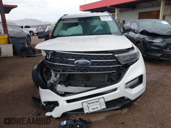 2022 Ford Explorer XLT z VIN 1FMSK7DH0NGB25926, wystawiony jako IAAI lot #42181595 z przebiegiem 15 063 mil mil oraz . Historia ofert i sprzedaży dostępna na DreamBid. Obrazek 12.