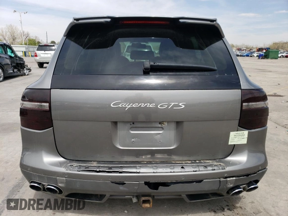 2009 Porsche Cayenne GTS z VIN WP1AD29P19LA62893, wystawiony jako Copart lot #54410625 z przebiegiem 113 366 mil mil oraz Szkody całkowita. Historia ofert i sprzedaży dostępna na DreamBid. Obrazek 6.