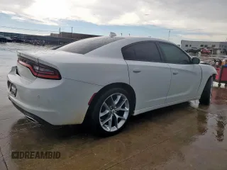 2022 Dodge Charger SXT with VIN 2C3CDXBG6NH166941, listed as a Copart auction lot 54659165 with 26,409 mi miles and Salvage Title. Bid and sale history available at DreamBid. Image 3.