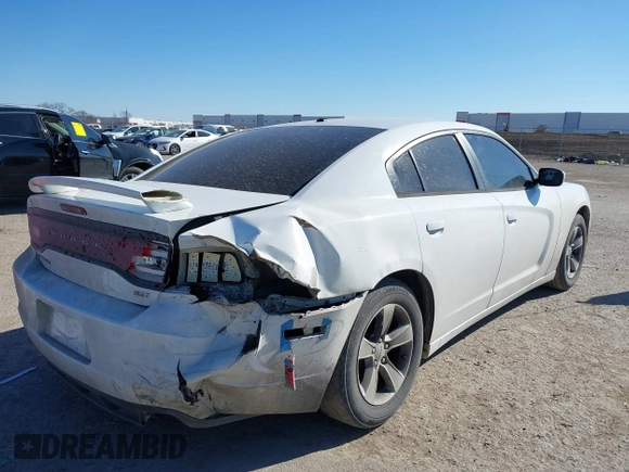 2014 Dodge Charger SXT with VIN 2C3CDXHG2EH104640, listed as a IAAI auction lot 41379760 with 122,664 mi miles and . Bid and sale history available at DreamBid. Image 4.