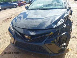 2018 Toyota Camry LE z VIN 4T1B11HKXJU652275, wystawiony jako IAAI lot #42245625 z przebiegiem 49 596 mil mil oraz . Historia ofert i sprzedaży dostępna na DreamBid. Obrazek 12.