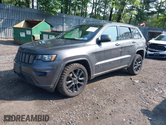2017 Jeep Grand Cherokee Altitude with VIN 1C4RJFAG4HC807439, listed as a IAAI auction lot 42468652 with 149,807 mi miles and . Bid and sale history available at DreamBid. Image 2.