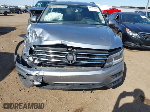 2019 Volkswagen Tiguan SE with VIN 3VV2B7AX1KM170926, listed as a IAAI auction lot 41953801 with 54,361 mi miles and . Bid and sale history available at DreamBid. Image 12.