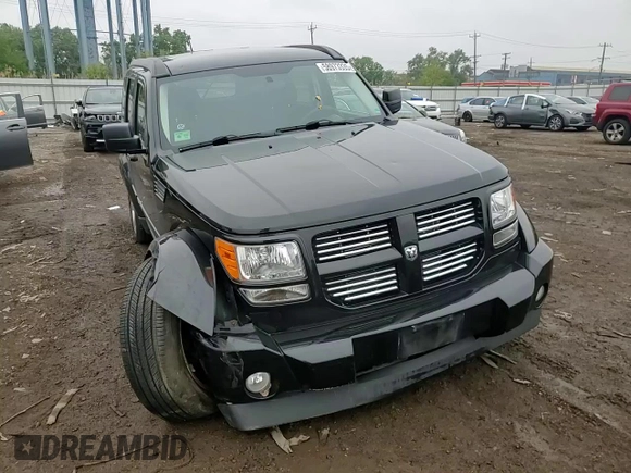 2011 Dodge Nitro Heat with VIN 1D4PT4GK7BW597557, listed as a Copart auction lot 58973335 with 180,958 mi miles and Salvage title. Bid and sale history available at DreamBid. Image 13.