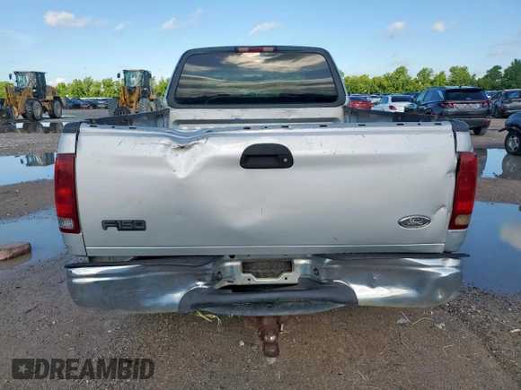 2000 Ford F-150 XL с VIN 1FTRX17L6YKB45245, выставлен на аукционе Copart как лот 62365195 с пробегом 306 210 миль миль и Списание • Salvage title. История ставок и продаж доступна на DreamBid. Изображение 6.