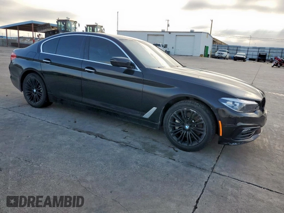 2017 BMW 5 Series 530i with VIN WBAJA5C35HG897952, listed as a Copart auction lot 55691385 with 135,869 mi miles and Salvage title. Bid and sale history available at DreamBid. Image 4.