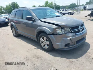 2013 Dodge Journey American Value with VIN 3C4PDCAB5DT630674, listed as a IAAI auction lot 42520369 with 232,741 mi miles and . Bid and sale history available at DreamBid. Image 1.