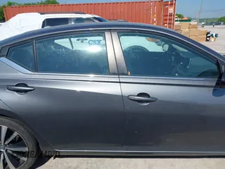 2019 Nissan Altima 2.5 SR with VIN 1N4BL4CV0KC163432, listed as a IAAI auction lot 42130104 with 186,452 mi miles. Bid and sale history available at carsss.com. Image 13.