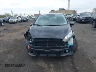2017 Ford Fiesta SE z VIN 3FADP4BJ4HM153649, wystawiony jako IAAI lot #42037378 z przebiegiem 78 540 mil mil oraz . Historia ofert i sprzedaży dostępna na DreamBid. Obrazek 13.
