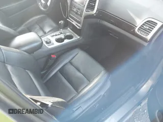 2011 Jeep Grand Cherokee 70th Anniversary with VIN 1J4RR4GT6BC715848, listed as a IAAI auction lot 41562152 with 119,910 mi miles. Bid and sale history available at carsss.com. Image 5.