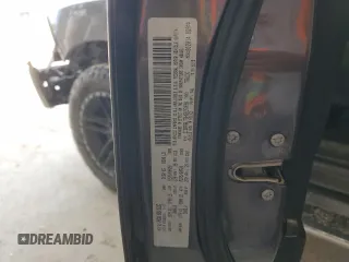 2017 Ram 1500 Lone Star z VIN 3C6RR6LT9HG637098, wystawiony jako Copart lot #55029165 z przebiegiem 98 995 mil mil oraz Szkoda całkowita • Salvage title. Historia ofert i sprzedaży dostępna na DreamBid. Obrazek 13.