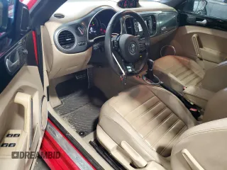 2015 Volkswagen Beetle with VIN 3VW7S7AT1FM822318, listed as a Copart auction lot 71398644 with 73,421 mi miles and Salvage Title. Bid and sale history available at DreamBid. Image 8.