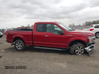2018 Ford F-150 XL with VIN 1FTFX1E51JKF98962, listed as a IAAI auction lot 41827587 with 128,031 mi miles and . Bid and sale history available at DreamBid. Image 12.