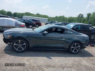 2016 Ford Mustang V6 with VIN 1FA6P8AM6G5263781, listed as a IAAI auction lot 42375721 with 91,519 mi miles and . Bid and sale history available at DreamBid. Image 15.