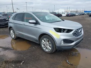 2020 Ford Edge Titanium z VIN 2FMPK4K91LBB35370, wystawiony jako IAAI lot #42126038 z przebiegiem 88 484 mil mil oraz . Historia ofert i sprzedaży dostępna na DreamBid. Obrazek 1.