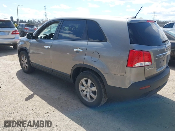 2011 Kia Sorento LX with VIN 5XYKTCA1XBG032086, listed as a IAAI auction lot 42026859 with 177,449 mi miles. Bid and sale history available at carsss.com. Image 3.