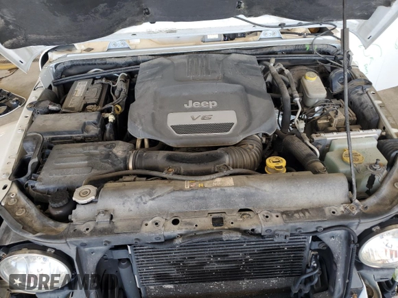 2015 Jeep Wrangler Unlimited Sahara with VIN 1C4BJWEG2FL620001, listed as a Copart auction lot 63914725 with 114,810 mi miles and Salvage title. Bid and sale history available at DreamBid. Image 11.