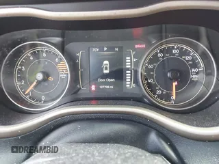 2016 Jeep Cherokee Latitude z VIN 1C4PJMCB9GW293047, wystawiony jako IAAI lot #42325392 z przebiegiem 127 706 mil mil oraz . Historia ofert i sprzedaży dostępna na DreamBid. Obrazek 7.