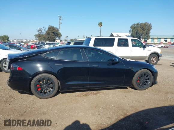 2020 Tesla Model S Long Range with VIN 5YJSA1E24LF381878, listed as a IAAI auction lot 41965340 with 47,468 mi miles. Bid and sale history available at carsss.com. Image 13.