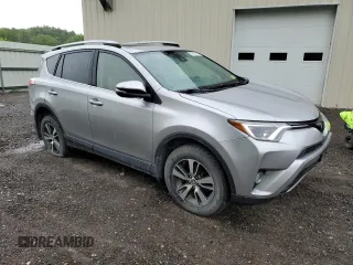 2018 Toyota RAV4 XLE with VIN JTMRFREV2JJ200677, listed as a Copart auction lot 59660535 with 82,283 mi miles and Salvage title. Bid and sale history available at DreamBid. Image 4.