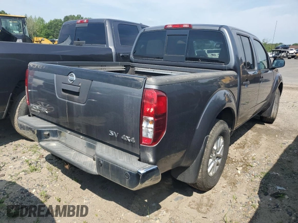 2019 Nissan Frontier Pro-4X with VIN 1N6AD0EVXKN873772, listed as a Copart auction lot 59573645 with 103,574 mi miles and Salvage title. Bid and sale history available at DreamBid. Image 3.