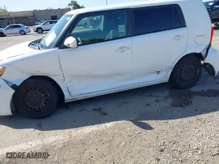 2013 Scion xB with VIN JTLZE4FEXDJ037953, listed as a IAAI auction lot 42002490 with 106,206 mi miles. Bid and sale history available at carsss.com. Image 6.