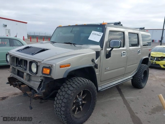 2003 Hummer H2 with VIN 5GRGN23U03H123344, listed as a IAAI auction lot 41093664 with 182,374 mi miles. Bid and sale history available at carsss.com. Image 2.