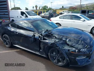 2021 Ford Mustang GT z VIN 1FA6P8CF1M5147740, wystawiony jako IAAI lot #38920487 z przebiegiem 15 299 mil mil oraz . Historia ofert i sprzedaży dostępna na DreamBid. Obrazek 6.